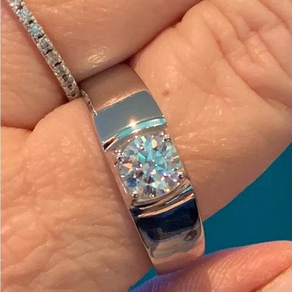 Other - 1 CT Moissanite 
Smooth polished band
Set in 925 sterling silver